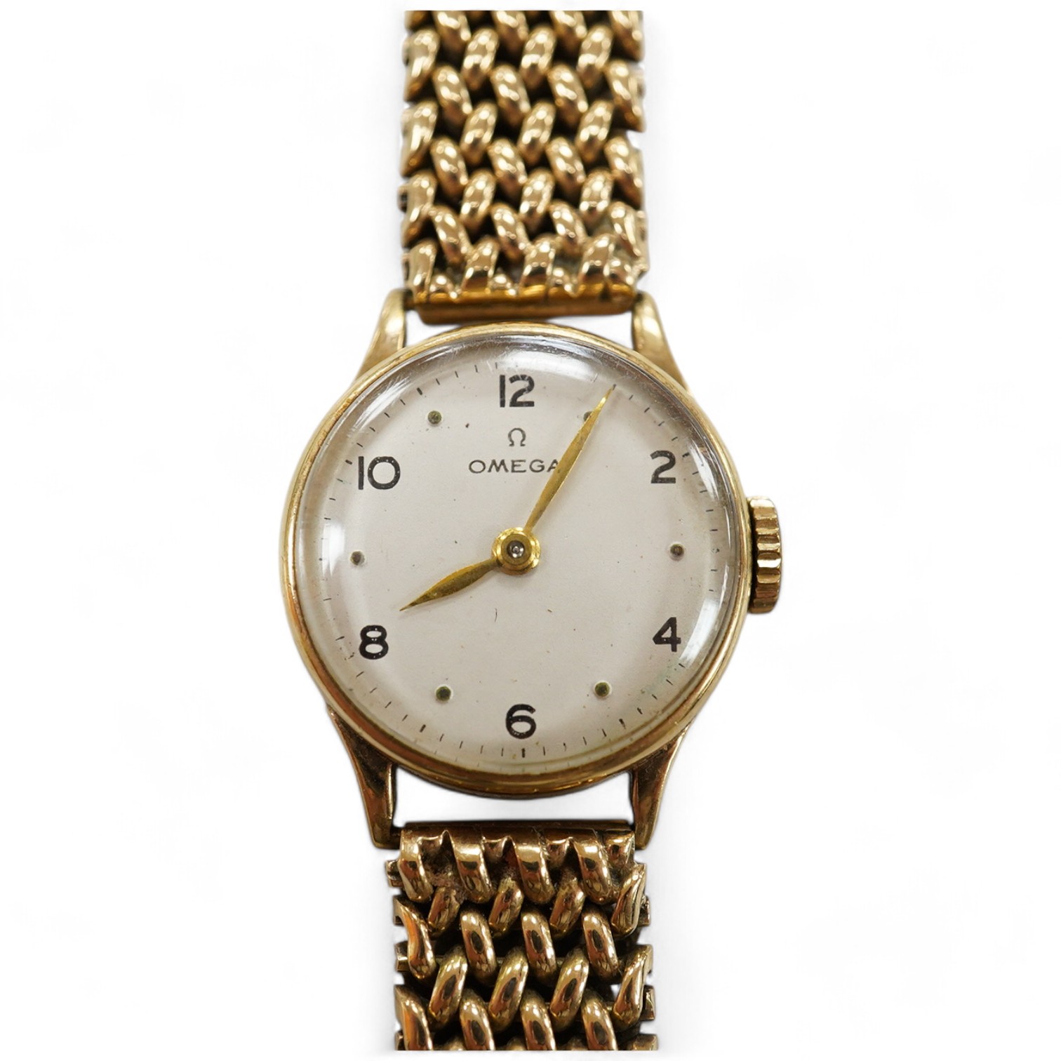 A lady's 9ct gold Omega manual wind wrist watch, on an associated 9ct bracelet, with Arabic and dot numerals, case diameter 20mm, overall length 16.7cm, gross weight 30 grams., no box or papers, with spare bracelet parts